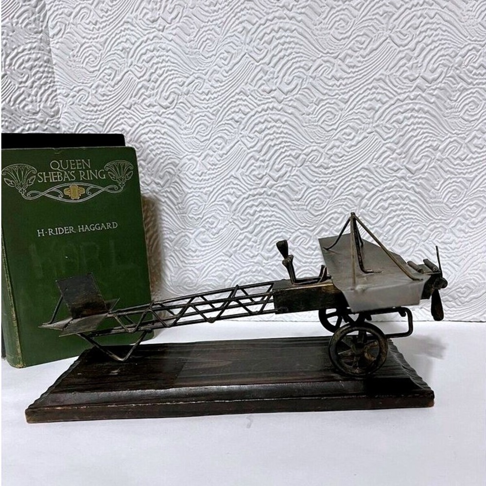 Metal and Wood Plane Statue